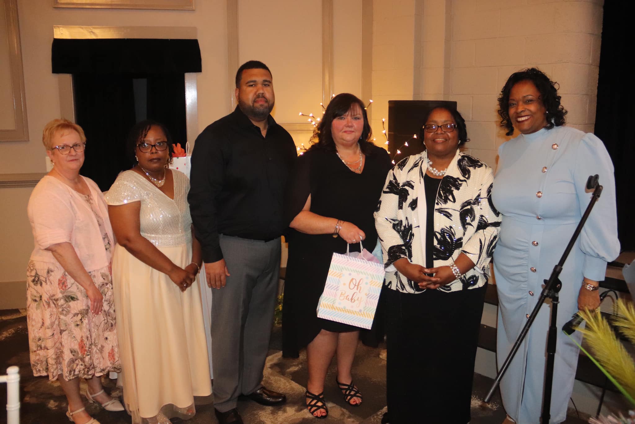 Diane Layne, VP of Administration, Latonya Harris, VP of Public Relations, Reggie and Samantha Newell, Alfredia Lee, VP of Administration, Rachel Brown, President